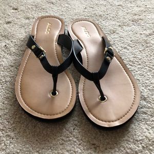 Black strap flip flops